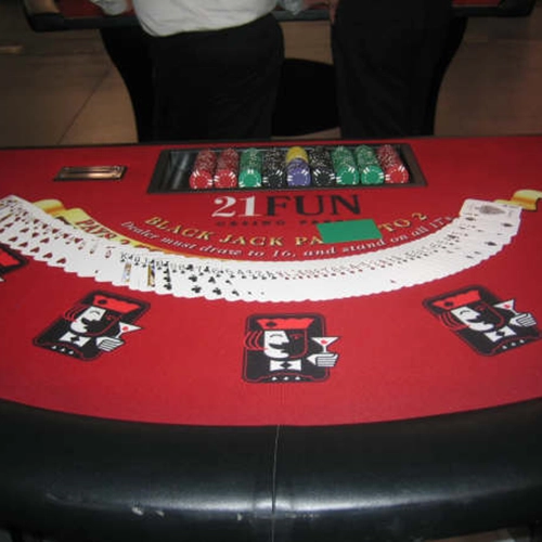 Blackjack table with custom felts and cards.